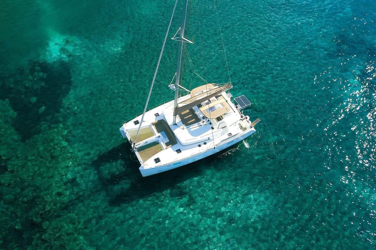 Catamaran sailing tour around Santorini caldera