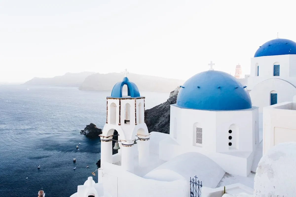 Blue-domed churches above the Santorini caldera
